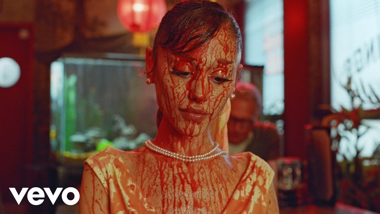 Ariana Grande in the blood-soaked horror finale of the Petal music video