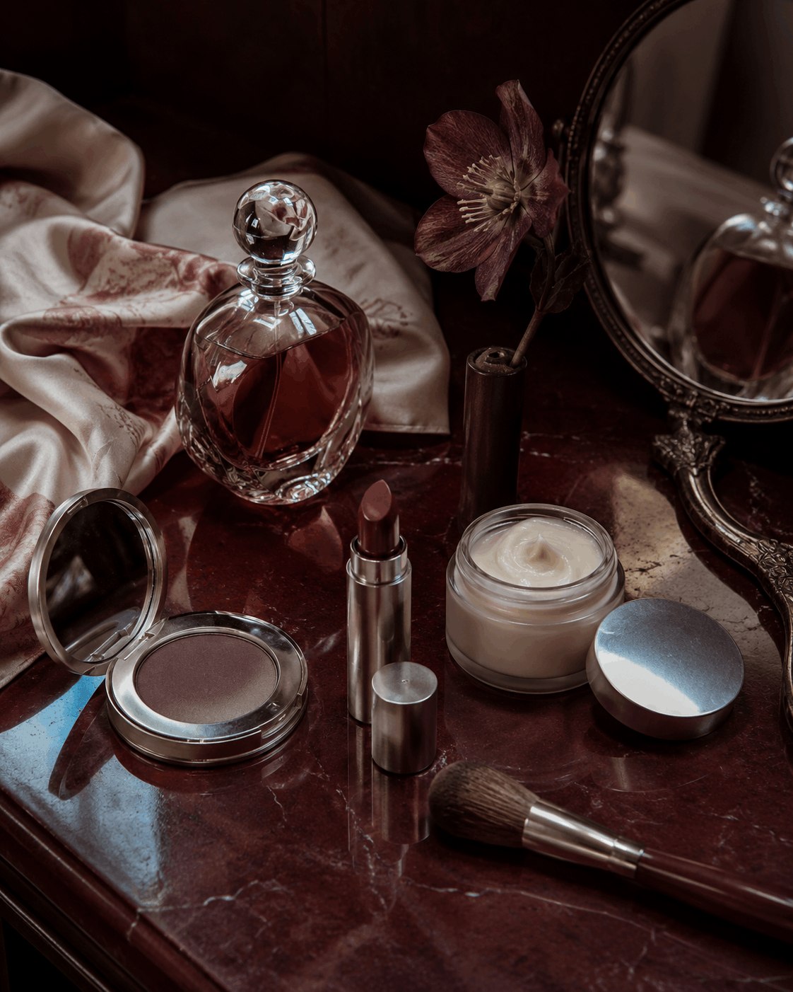 Editorial beauty still life with cosmetics and reflective objects